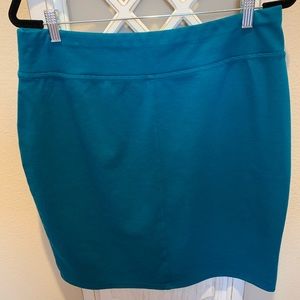 Turquoise elastic waist stretchy skirt.